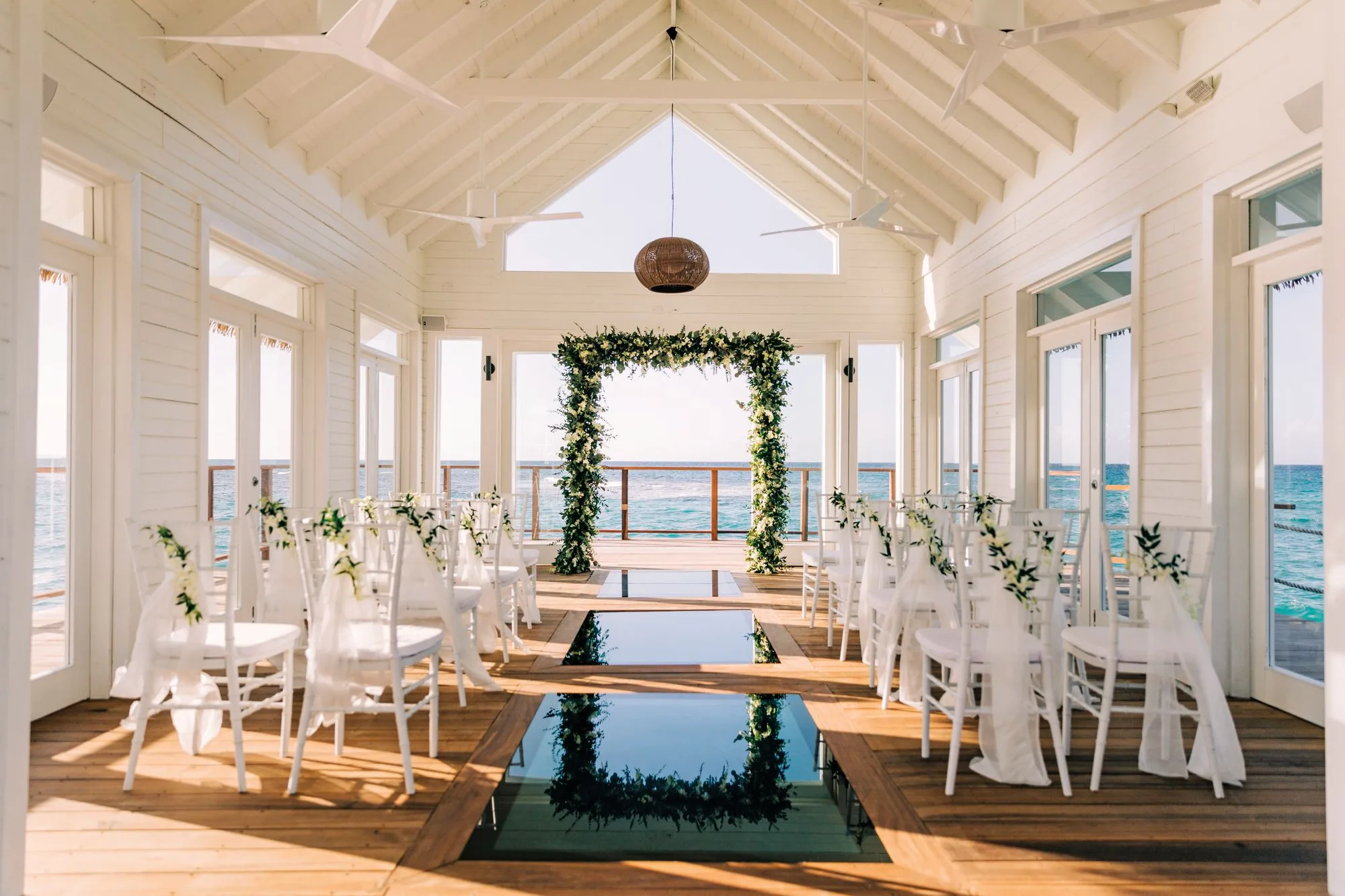 Caribbean beach destination wedding ceremony at sunset